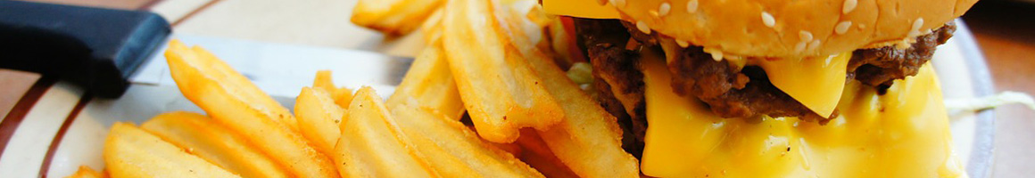 Eating Burger at Hamburger Mary's Denver restaurant in Denver, CO.
